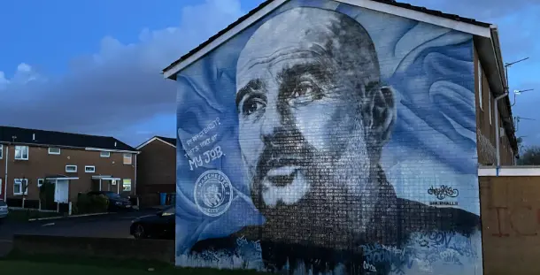 Wandgemälde mit dem Porträt des ehem. Trainers Pep Guardiola